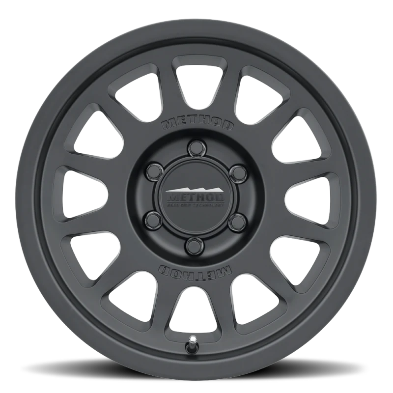 Method MR703 17x8.5 +25mm Offset 6x135 87mm CB Matte Black Wheel